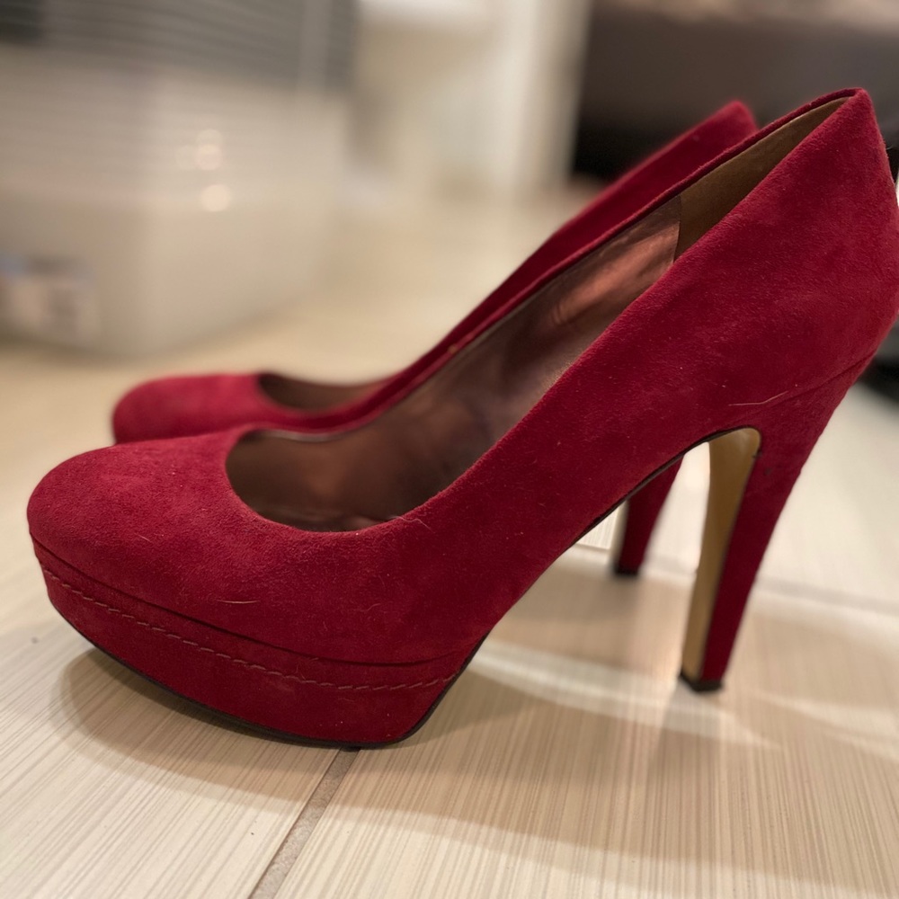 Red suede pumps